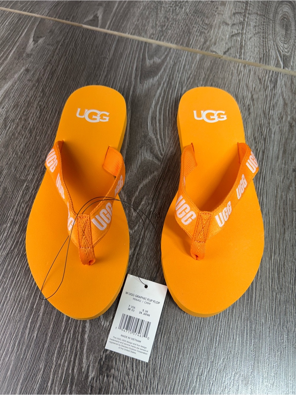 UGG graphic Orange Logo Flip Flop Sandals size 7